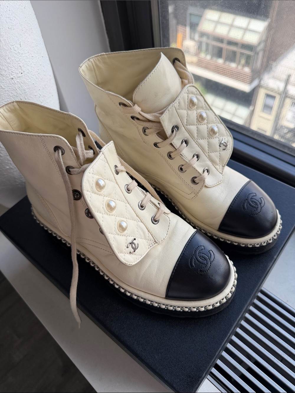 CHANEL Cream Leather Lace-Up Combat Boots with Black Cap Toe